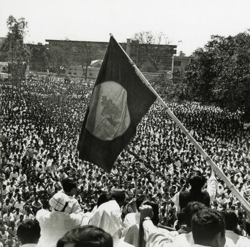  2 March 1971: Student leaders hoist the national flag of independent Bangladesh at the Dhaka University premises. Credits: Jalaluddin Haider/Drik/Majority World